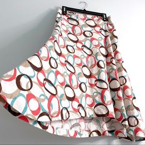 Cato Asymmetrical Skirt in Retro Print with Lining and High Low Cut
